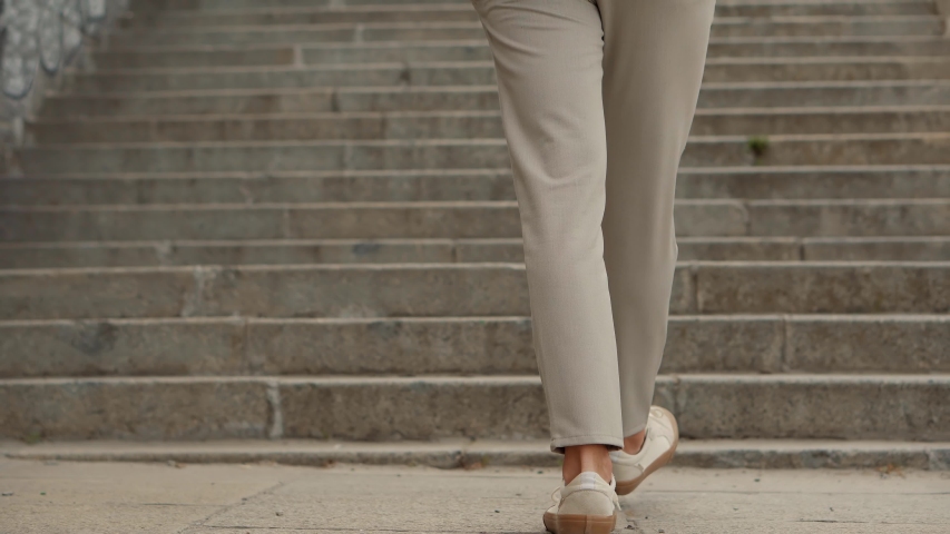 Stylish Businessman Legs Leisure Walking Up On Stairs On Vacation Holiday In Summer Day. Man Feet Wearing Pants And Shoes Walking Up Stair. Stylish Businessman Resting Walks Up On Steps On City Street Royalty-Free Stock Footage #1051118314