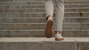 Stylish Businessman Legs Leisure Walking Up On Stairs On Vacation Holiday In Summer Day. Man Feet Wearing Pants And Shoes Walking Up Stair. Stylish Businessman Resting Walks Up On Steps On City Street - Powered by Shutterstock - Get 15% off with code: PIKWIZARD15