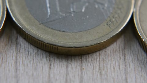 See one euro coins on top, 
europe economy