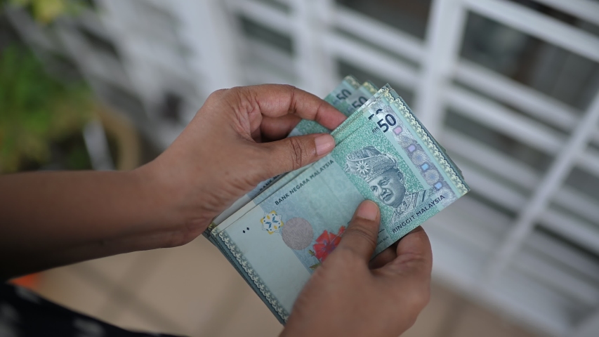 Count Malaysia currency money RM50 Ringgit by hand in cash | Shutterstock HD Video #1051133182