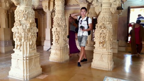 JAISALMER, RAJASTHAN / INDIA - October 20, 2019: the Parshwanath jain temple with elaborate and intricately carved pillars from golden stone