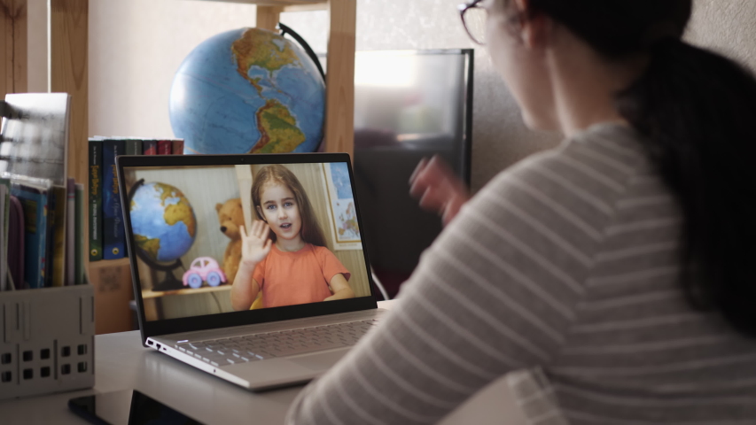 Video Call. Distance Education. Little Child Video Call Via Laptop Talking to Mom. Online Tutor, Mother, Pediatrician Talking With Kid Video Calling Using Computer. Home Conference Children Education. | Shutterstock HD Video #1051136146