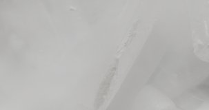 Close-up video of pieces of white dry ice