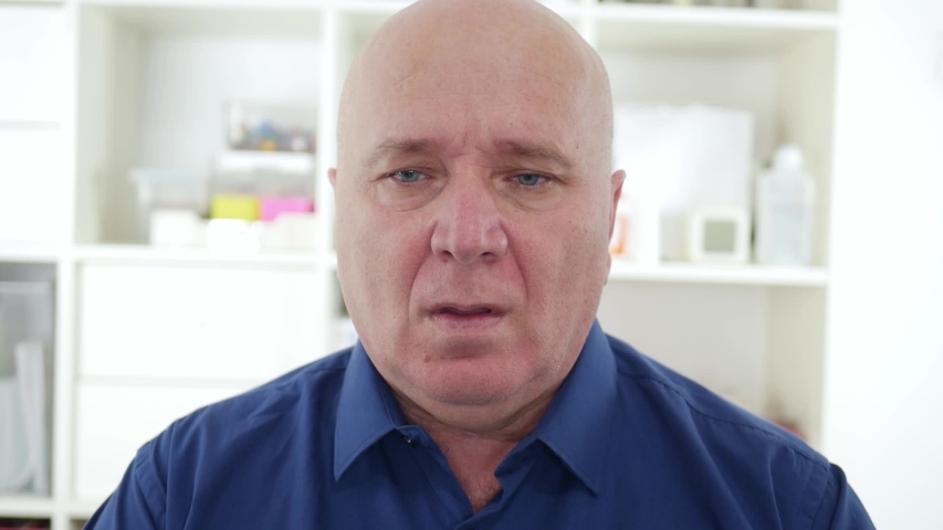 Slow Motion with Sick Elderly Person Coughs and Sneezes Spreading Around COVID-19 and Bacteria Causing the Coronavirus Pandemic