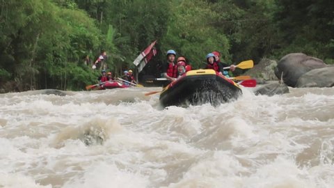 Yogyakarta, Indonesia - May 17, 2014: Rafting on the Progo River has become one of the favorite tourists