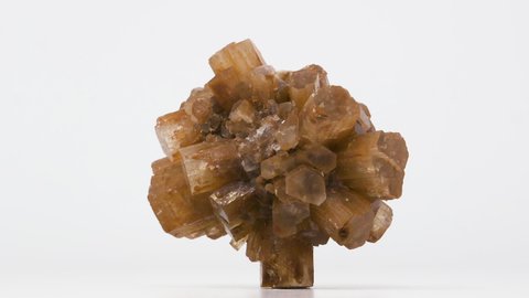 Very close view of Arogonite mineral sample. Rotating front to back.