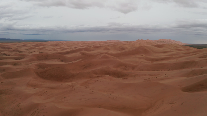 Storm Clouds Over Sand Dunes in the Desert 