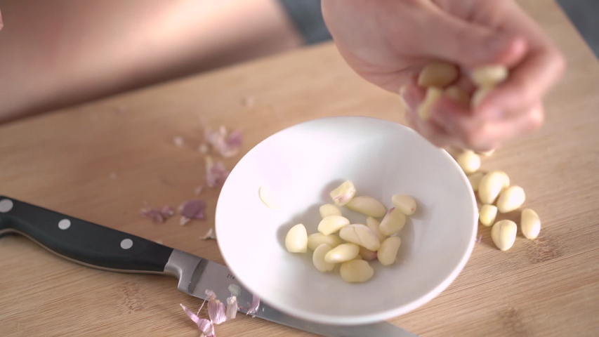 Hands Peeling Garlic with knife image - Free stock photo - Public ...