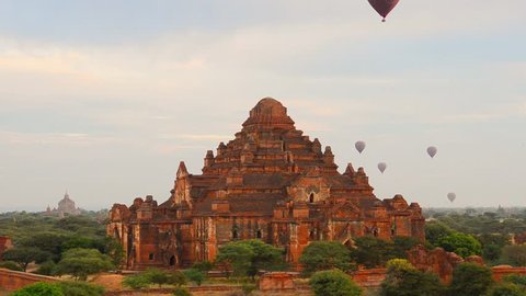 Hot air balloons over ancient temples in Bagan at dawn, Mandalay, Myanmar