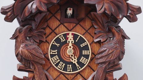 SOUTHWAITE, ENGLAND - APRIL 19:  A close up of a Swiss cuckoo clock striking 5 o'clock at a home in Southwaite in Cumbria in England on April 19, 2019.