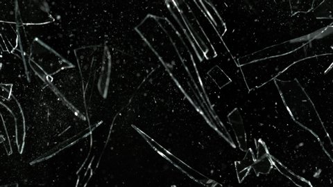 Super Slow Motion Shot of Falling Shards Isolated on Black Background at 1000 fps. Filmed with High Speed Cinema Camera in 4K resolution.