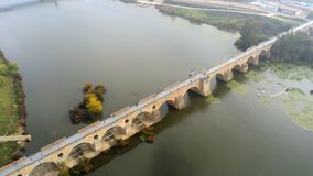 Guadiana River and Puente de Palmas Bridge in Badajoz. Extremadura, Spain. Aerial Video