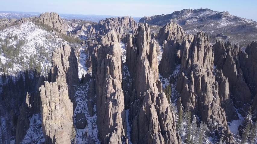 Dramatic Drone Circling Cathedral Spires Needles Granite Rocks Rock Outcropping Geology in Black Hills Forest