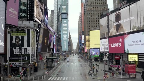 NEW YORK - APR 25, 2020: Times Square empty street during coronavirus COVID-19 pandemic quarantine lockdown - NY Strong ad billboard in Midtown Manhattan New York City NYC. 