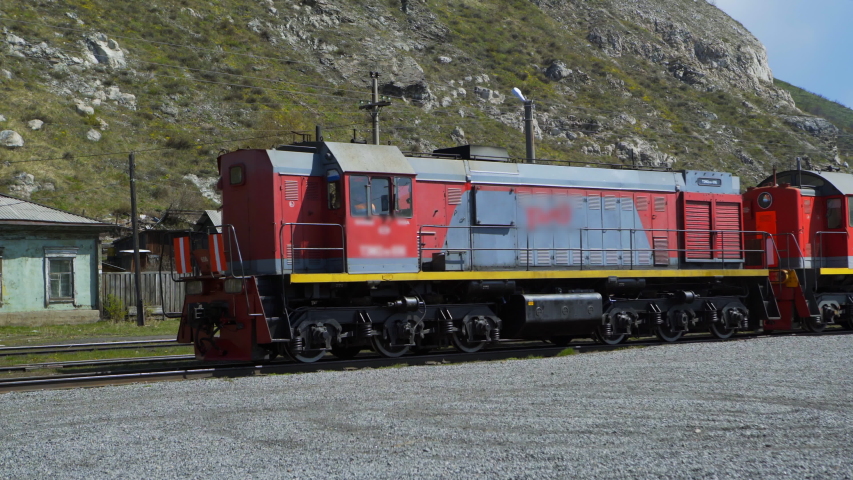 Pan Right to Left: Old Heavy Train Preparing to Travel the Long Journey - Lake Baikal, Russia