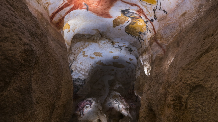 Rock art in the Lascaux Cave at the International Center for Parietal Art. Lascaux IV at Montignac in the Vézère Valley of the Dordogne. Perigord Noir, Nouvelle Aquitaine, France, Europe. UNESCO World Royalty-Free Stock Footage #1051340155