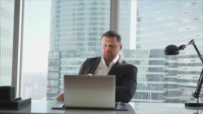 Single adult business man waiting for meeting to begin in Board room. A businessman at the end of the day gets up and goes home. A businessman stands at the table. Royalty-Free Stock Footage #1051355320