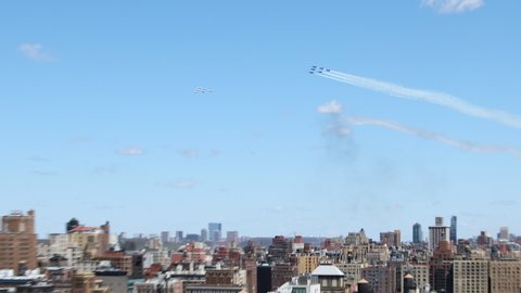 NEW YORK, NY, USA - 28 APRIL 2020: Upper West Side New York City Blue Angels & Thunderbirds Fly Over honor Health Care Workers, Frontline first responder Coronavirus, Covid-19