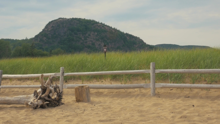 Man Lays Down on Towel, Sand Beach, Acadia National Park, Maine