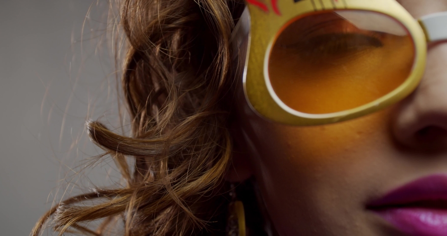 Pretty woman in silly glasses with guitars on them, 80s style party, 4k