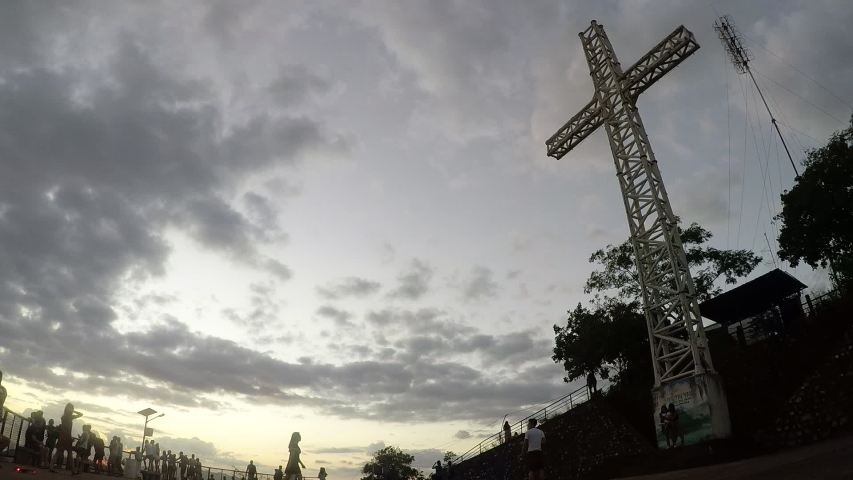 Timelapse - Coron Tip of Mount Tapyas cross. Break of dawn