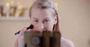 Female Makeup Artist Running online Makeup Course Streaming on Social Media