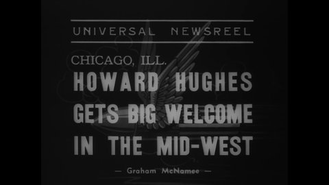 CIRCA 1938 - Howard Hughes arrives in Chicago, Illinois by plane, and is honored with a ticker-tape parade.