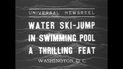 CIRCA 1936 - A man performs waterski jumps in a swimming pool in Washington DC.