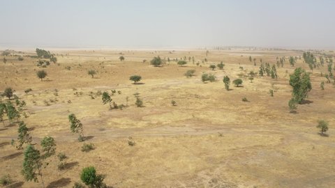 WEST AFRICA - CIRCA 2020 - aerial over the dry savannah landscapes of Senegal, Mali or Gambia in West Africa.