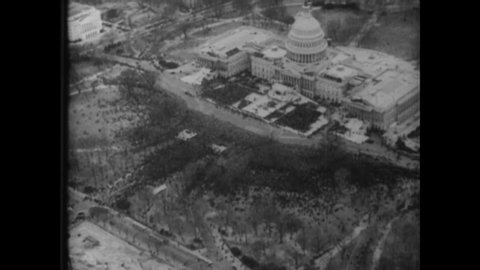 CIRCA 1933 - An aerial view shows the large crowd assembled outside the Capitol Building for FDR's inauguration.