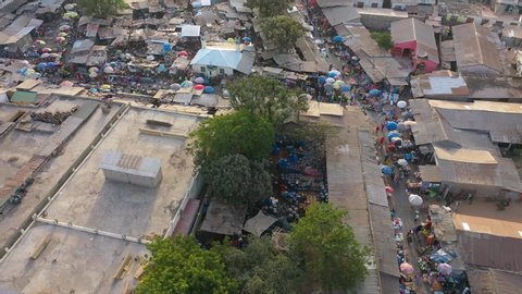 WEST AFRICA - CIRCA 2020 - Very good aerial over West African street market in Gambia.