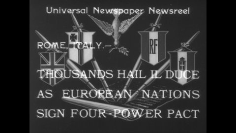 CIRCA 1933 - Benito Mussolini signs the Four Power Pact in Rome, Italy, alongside ambassadors of Germany, England, and France.