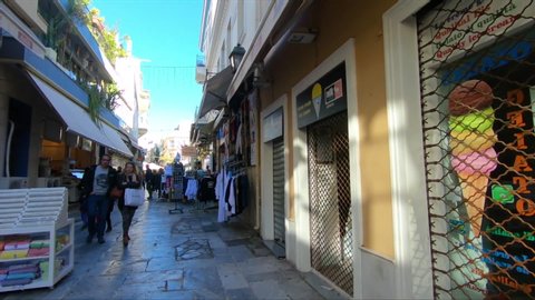 Athens / Greece 8,9,2018         video of people traveling in Plaka Neighborhood in Athens  , taking by handheld camera