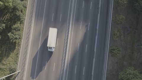 Aerial view of a road with the cars. High quality footage D-log, S-log