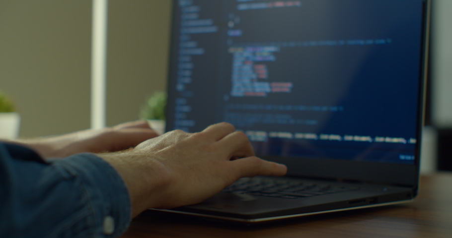 Closeup coding on screen, Man hands coding html and programming on screen laptop, development web, developer. | Shutterstock HD Video #1051486843