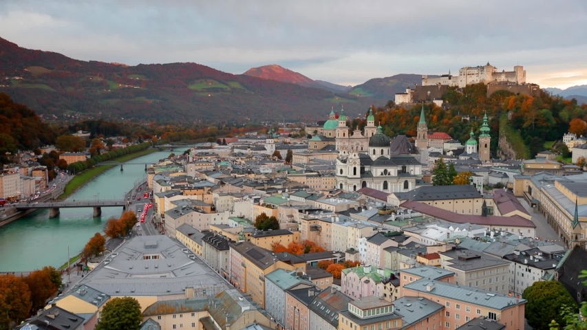 Time lapse clip. Full HD video (High Definition) of Salzburg, Old City, birthplace of famed composer Mozart. Fantastic autumn scene of Eastern Alps. Splendid  landscape with Salzach river.