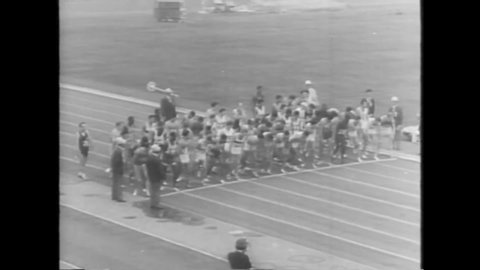 CIRCA 1964 - Ethiopian Abebe Bikila wins the marathon run at the summer Olympics hosted in Tokyo, Japan.