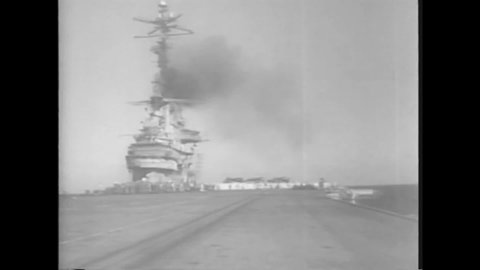 CIRCA 1962 - The US Navy's USS Randolph aircraft carrier prepares to recover the Friendship 7, but the capsule is off course.
