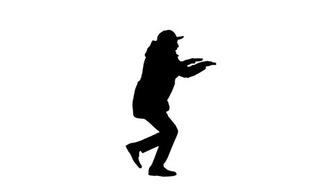Silhouette Hip-hop man singing rap, walking and making gestures.