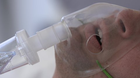 Coronavirus Intensive Care: A Patient With On A Ventilator Struggles To Breath With COVID19