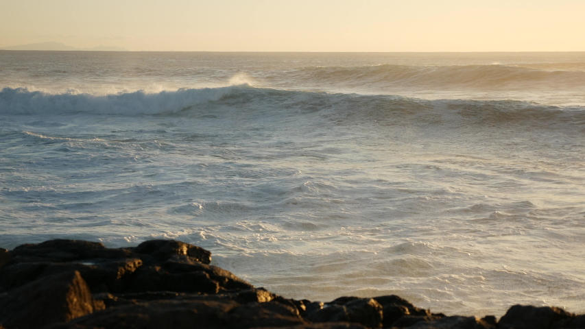 Atlantic ocean waves in sunset light on fuerteventura  | Shutterstock HD Video #1051544434