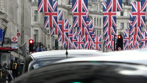 LONDON- APRIL, 2018: Zoom view of decorative union flags on Regent Street in London's West End
