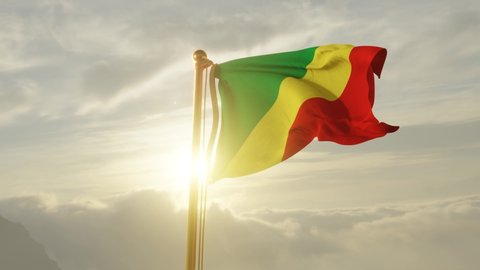 Flag of Republic of the Congo Waving in the wind, Sky and Sun Background, Slow Motion, Realistic Animation, 4K UHD 60 FPS Slow-Motion