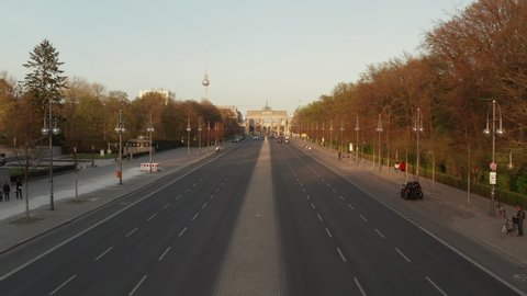 AERIAL: Empty Brandenburger Tor in Berlin, Germany due to Corona Virus COVID19 Pandemic in Sunset Light