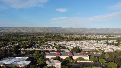 Drone flyover of Silicon Valley towards East foothills 