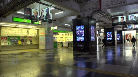 TOKYO, JAPAN - 28 APRIL 2020 : View around Shibuya train station. Tokyo governor called refrain from going outside, due to concerns over Coronavirus. Station is normally busy, but lightly populated.