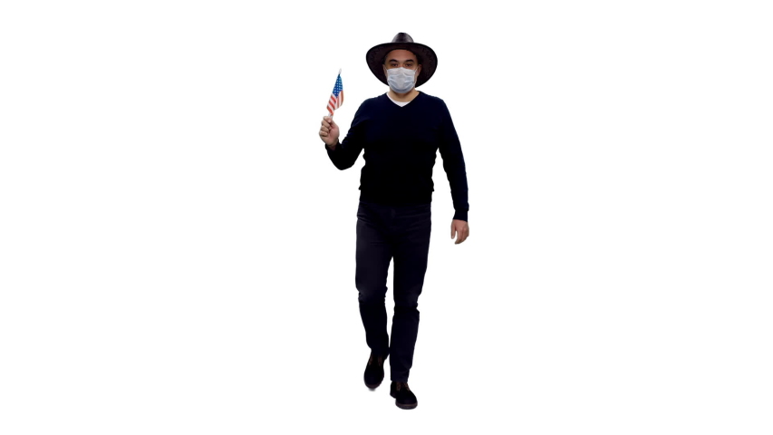 American adult male in mask and cowboy hat moving with waving flag of USA, Covid-19 Pandemic, Full HD footage isolated on white background with LUMA MATTE