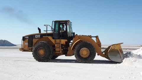 Konya, Turkey - August 24, 2014 : A Cat brand bulldozer is working at a salt pit at The Salt Lake , which is a second big lake of Turkey. Much of the salt reserve is provided from this lake.