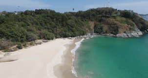 Aerial view 4K Footage Blue sky and blue ocean. Naiharn Beach of Phuket Thailand.Covid-19