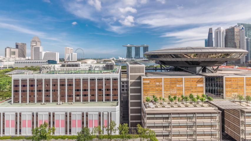 Aerial view of Singapore Marina Bay area timelapse with its financial and tourism district, including its latest Marina Bay Sands Integrated Resort in Singapore. Singapore Academy of Law on foreground